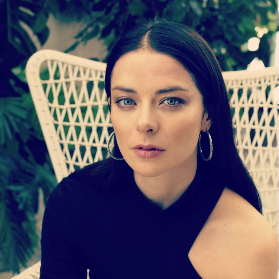 This is a square image with resolution 1080x1080, dominant color gray, approximately 2 main objects, containing 2 people.