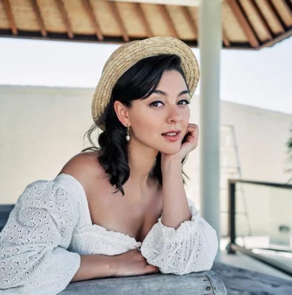 This is a portrait image with resolution 1200x1212, dominant color silver, approximately 4 main objects, containing 4 people.