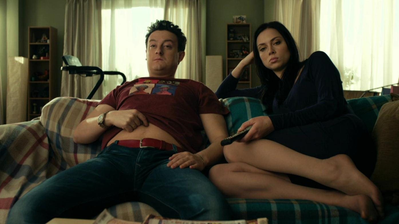 This is a landscape image with resolution 1394x784, dominant color olive, approximately 1 main objects, containing 2 people.