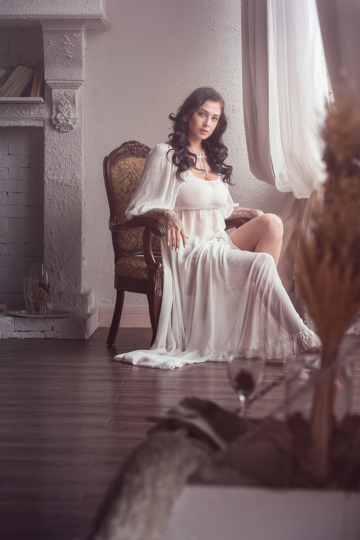 This is a portrait image with resolution 720x1080, dominant color gray, approximately 2 main objects, containing one person.