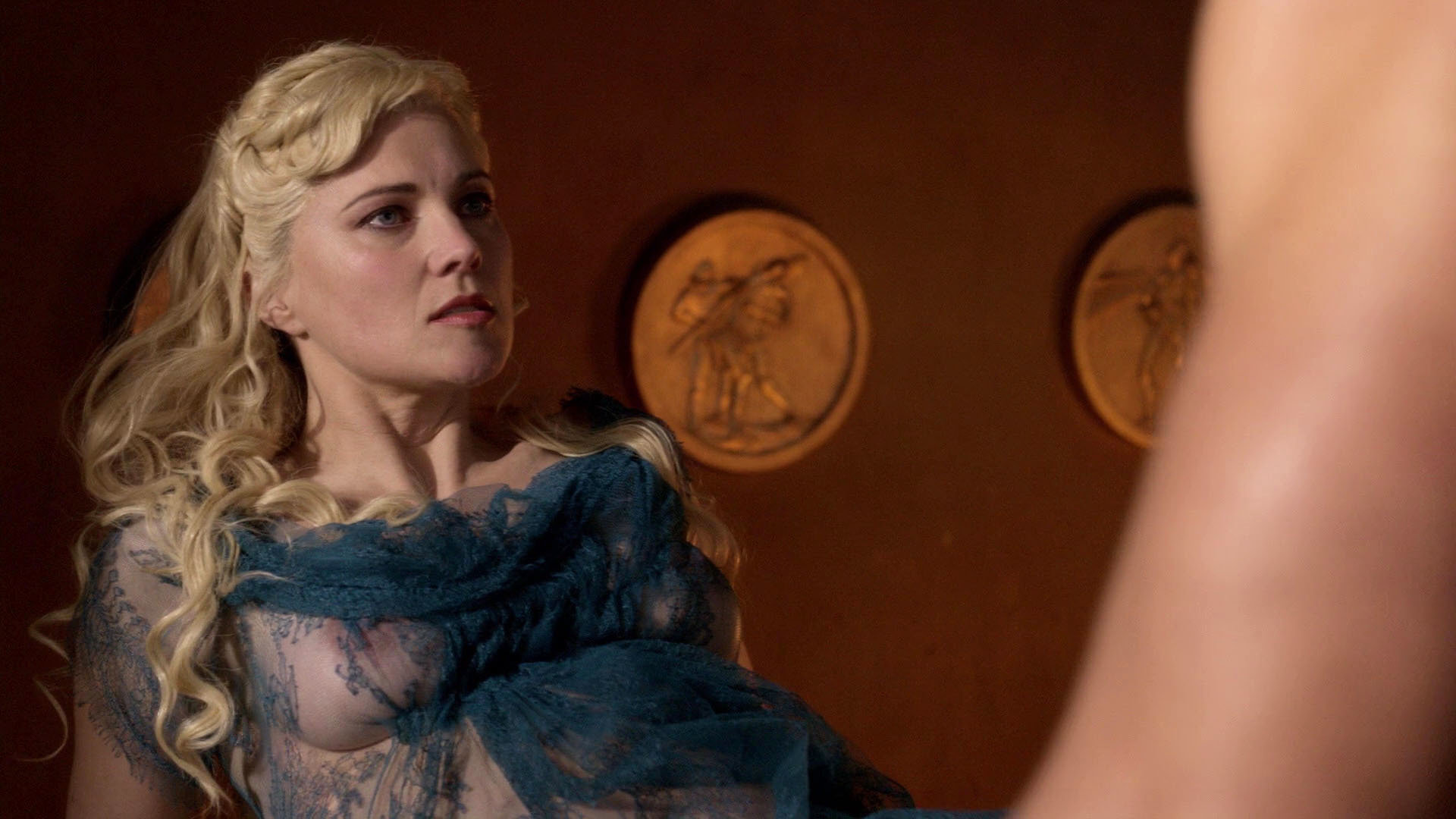 This is a landscape image with resolution 1920x1080, dominant color maroon, approximately 1 main objects, containing one person.