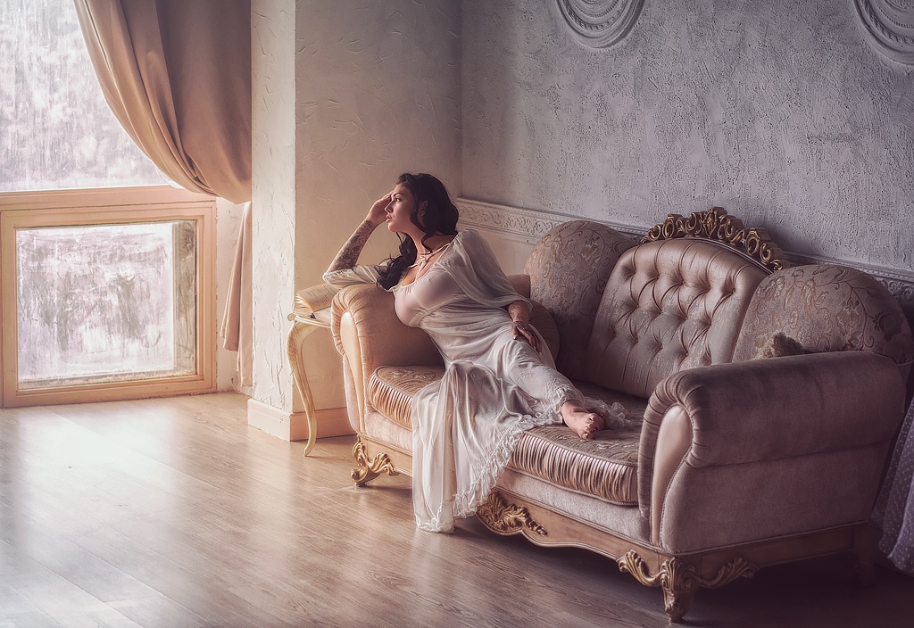 This is a landscape image with resolution 1024x704, dominant color gray, approximately 3 main objects, containing one person.