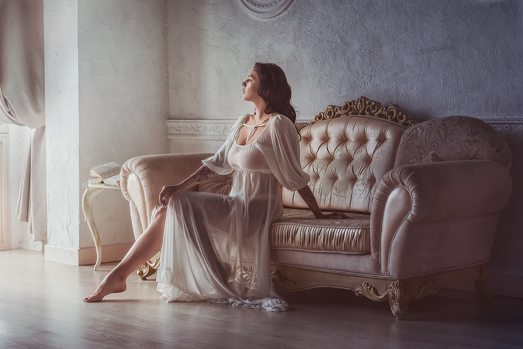 This is a landscape image with resolution 1024x685, dominant color gray, approximately 2 main objects, containing 2 people.