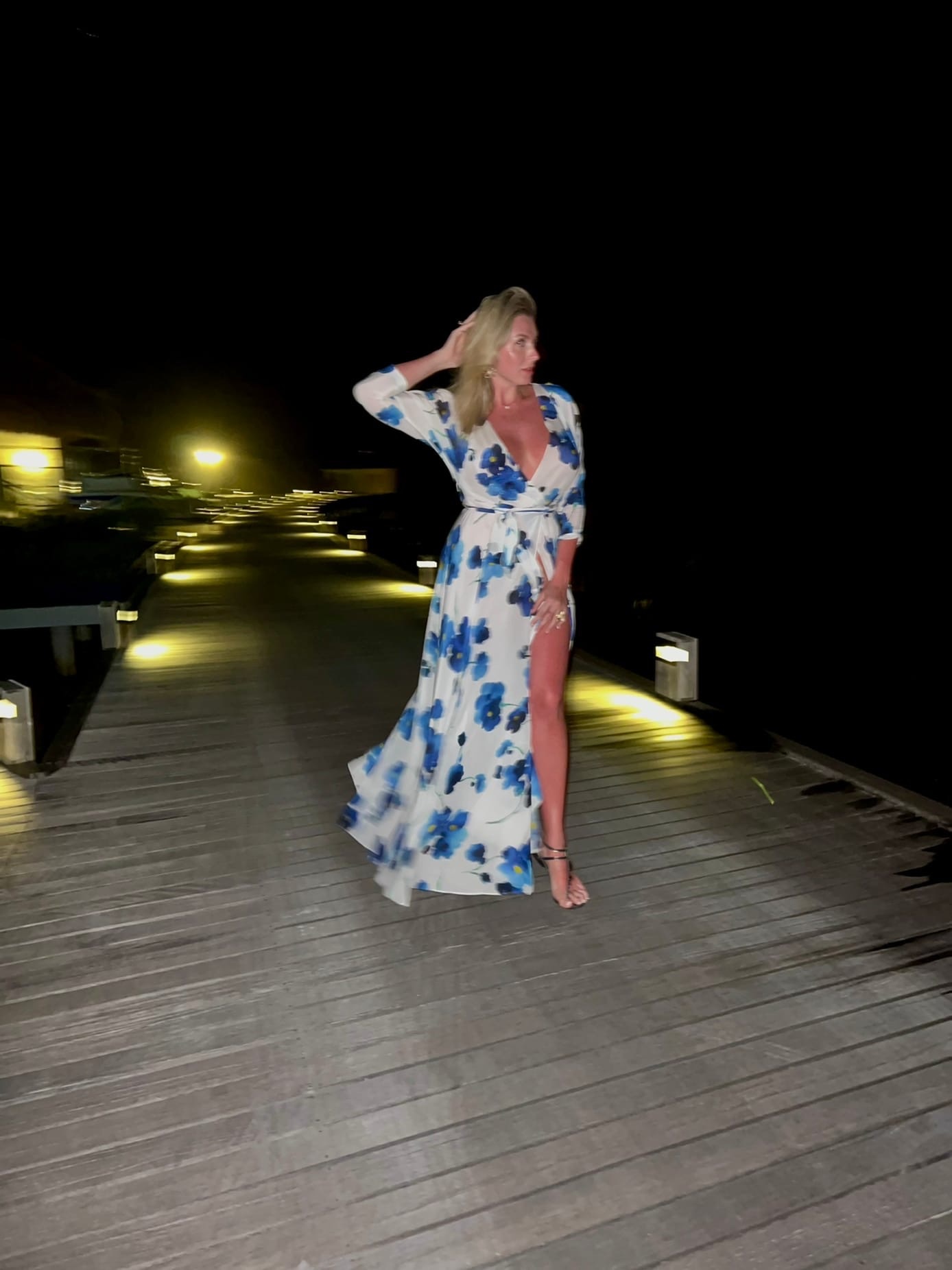 This is a portrait image with resolution 1388x1852, dominant color black, approximately 4 main objects, containing one person.