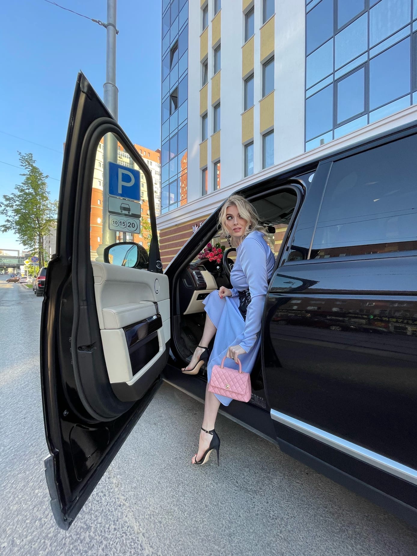 This is a portrait image with resolution 1388x1852, dominant color gray, approximately 5 main objects, containing one person.