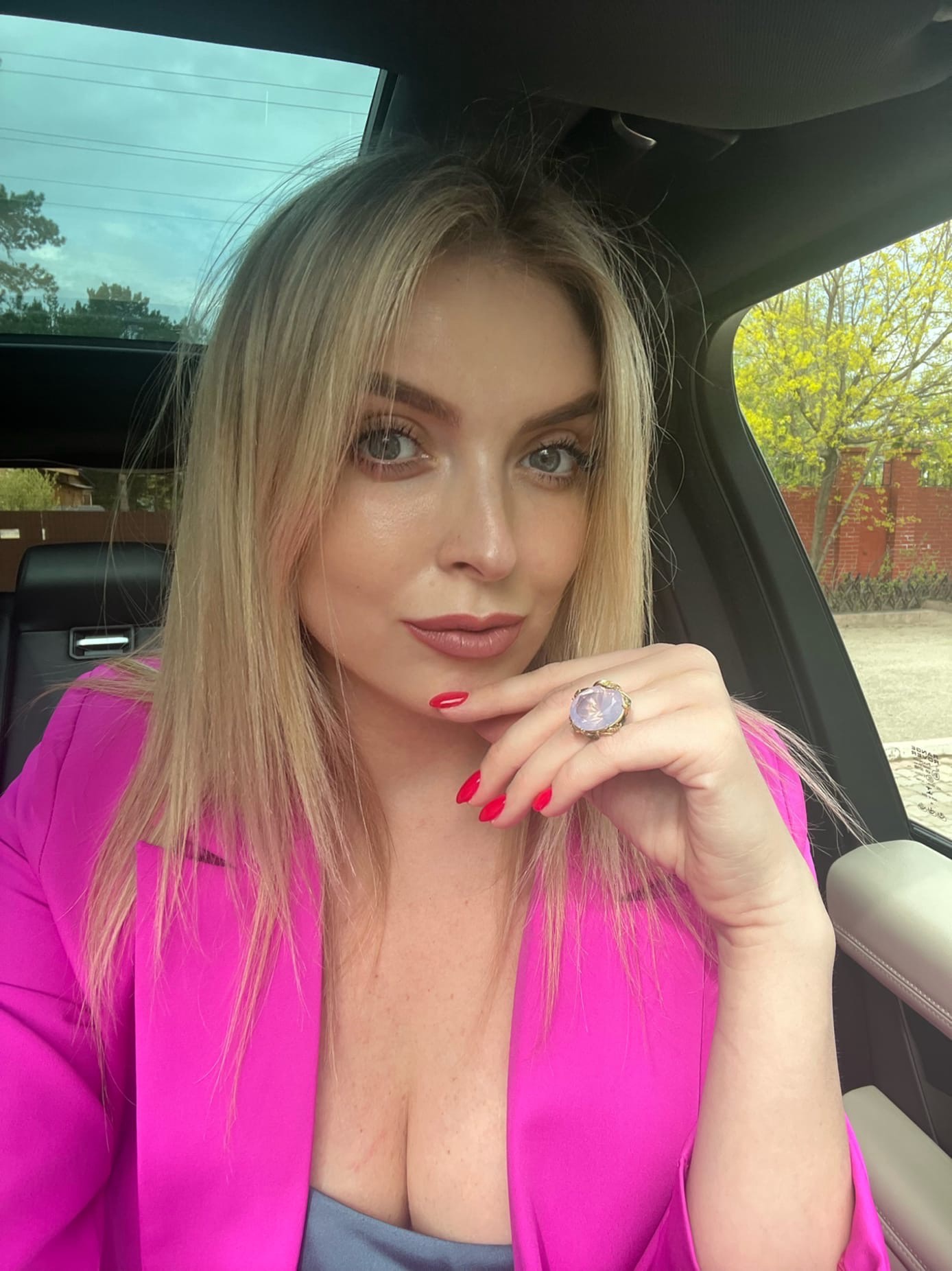 This is a portrait image with resolution 1388x1852, dominant color gray, approximately 5 main objects, containing one person.