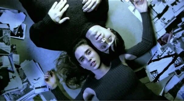 This is a landscape image with resolution 604x332, dominant color teal, approximately 2 main objects, containing one person.