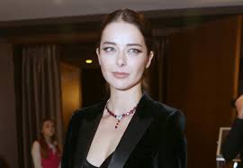 This is a landscape image with resolution 270x186, dominant color black, approximately 1 main objects, containing 2 people.