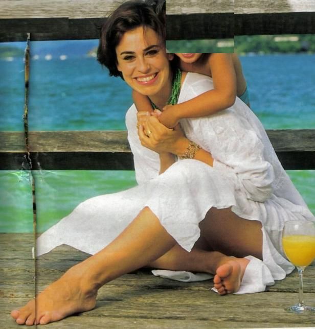 This is a portrait image with resolution 616x644, dominant color gray, approximately 1 main objects, containing one person.