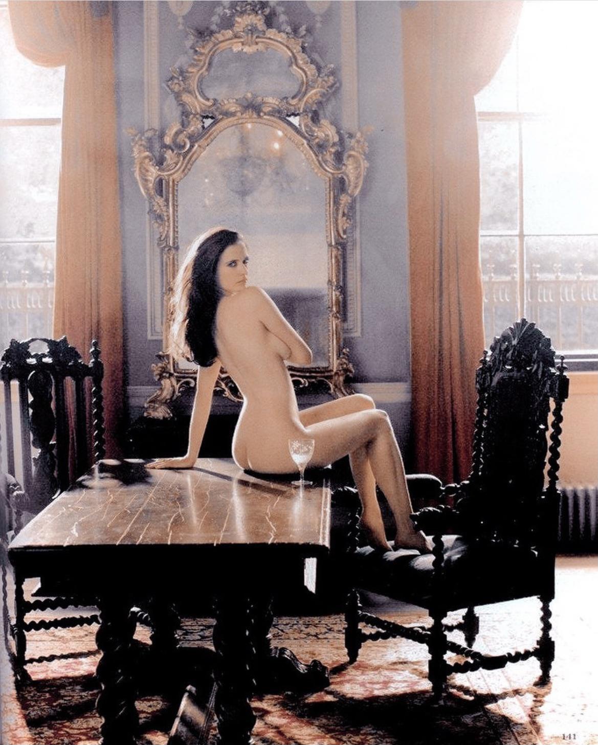 This is a portrait image with resolution 1169x1457, dominant color gray, approximately 5 main objects, containing 2 people.