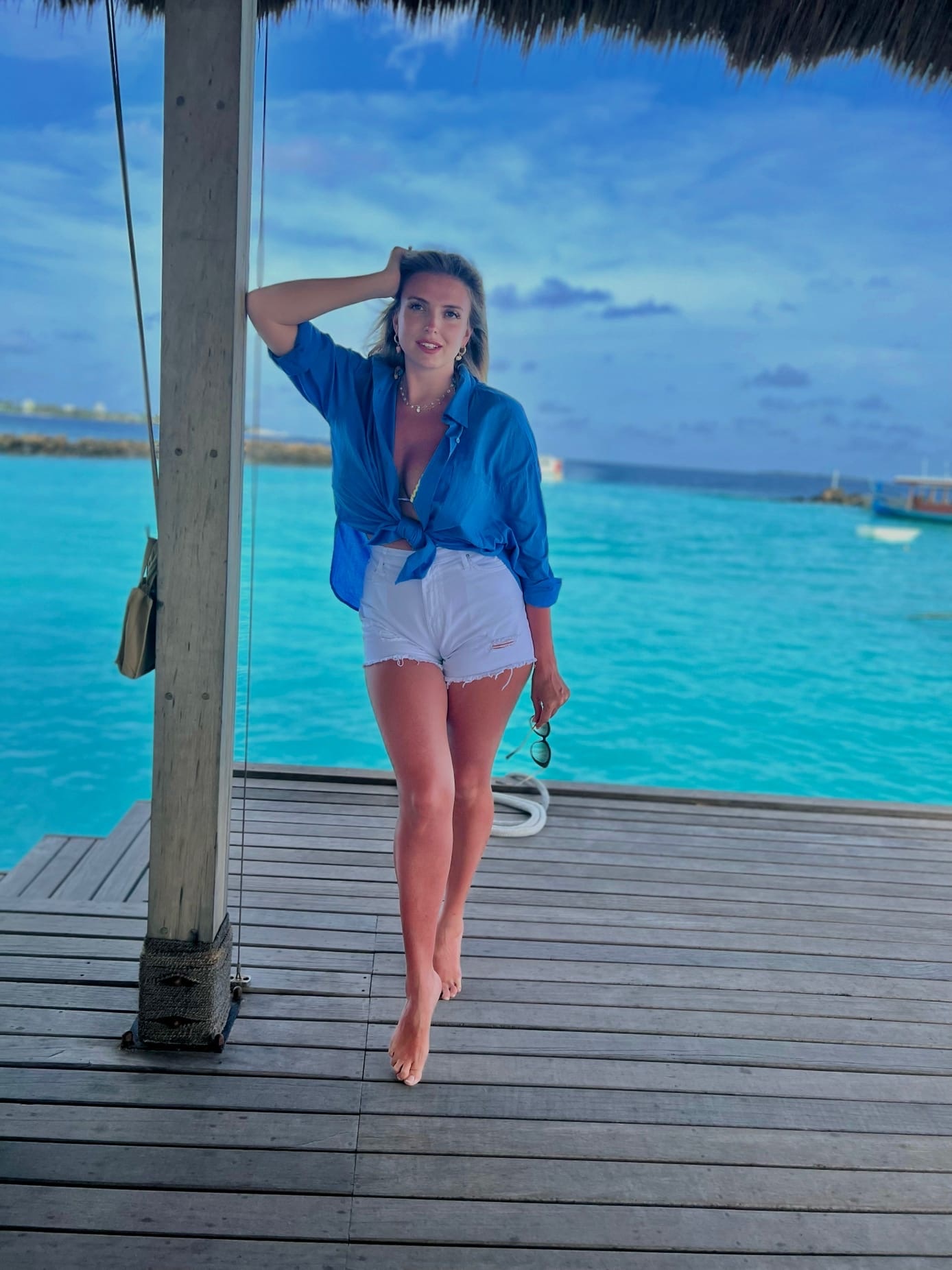 This is a portrait image with resolution 1388x1852, dominant color gray, approximately 3 main objects, containing 2 people.