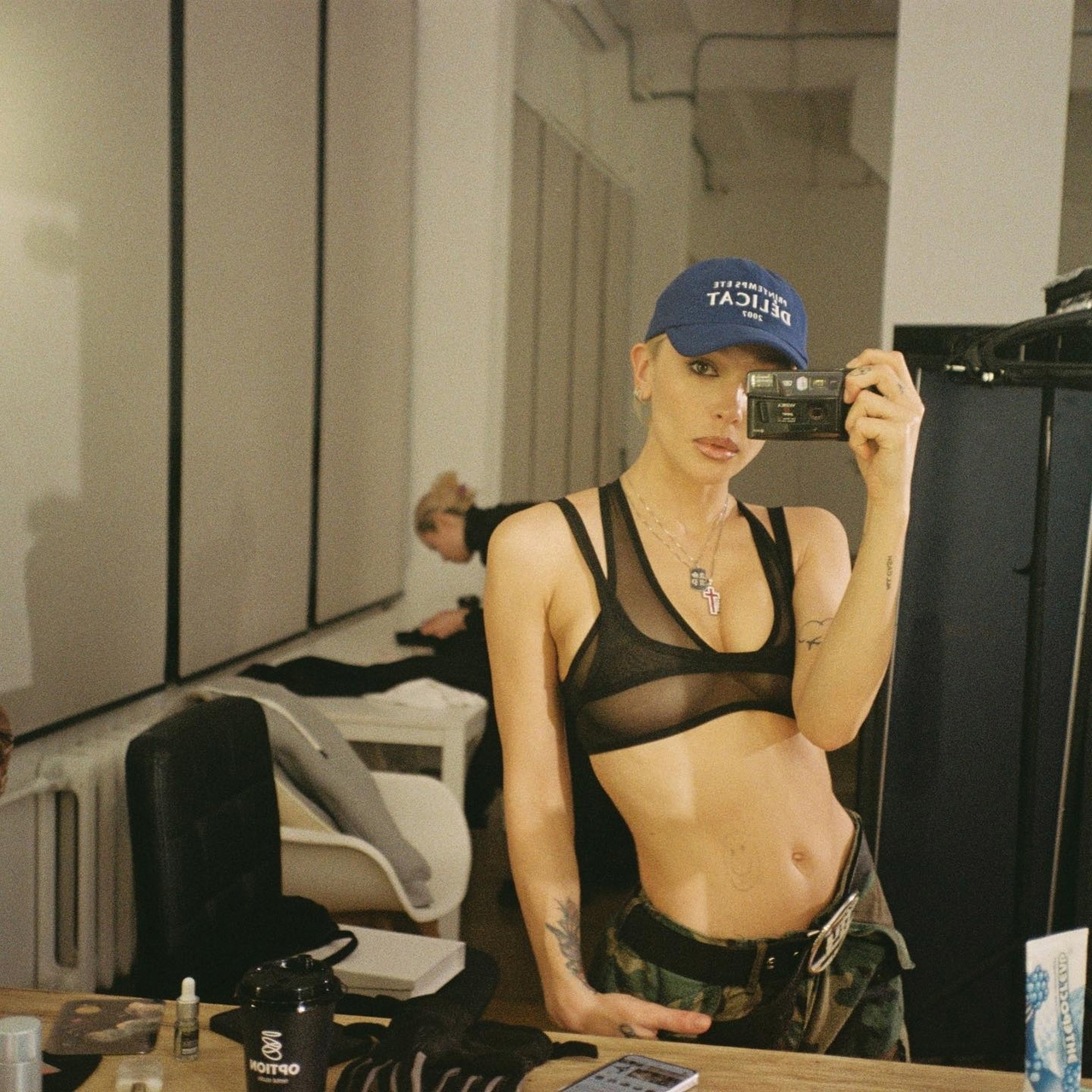 This is a square image with resolution 1280x1280, dominant color gray, approximately 3 main objects.