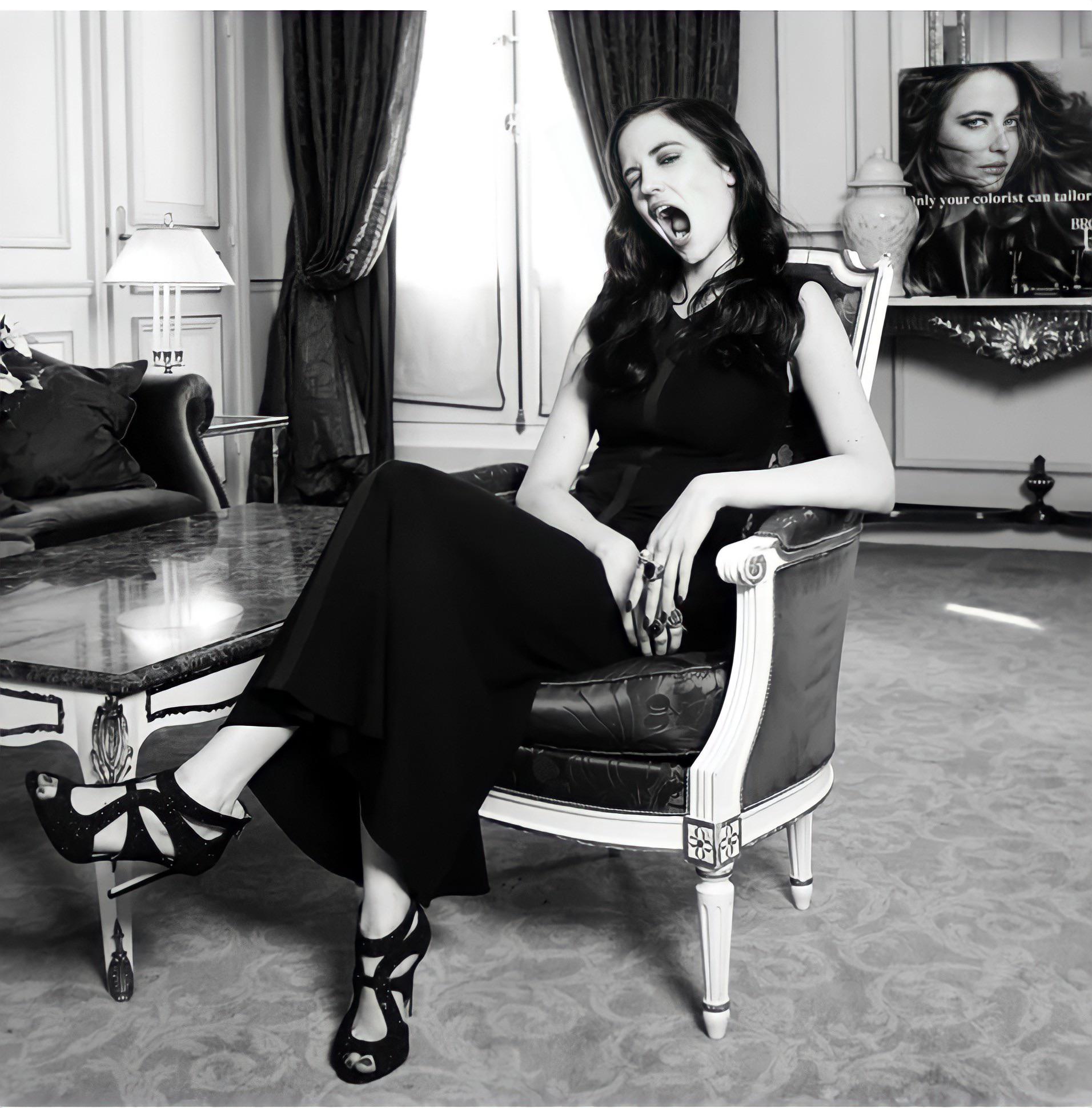 This is a portrait image with resolution 1912x1940, dominant color gray, approximately 5 main objects, containing 2 people.